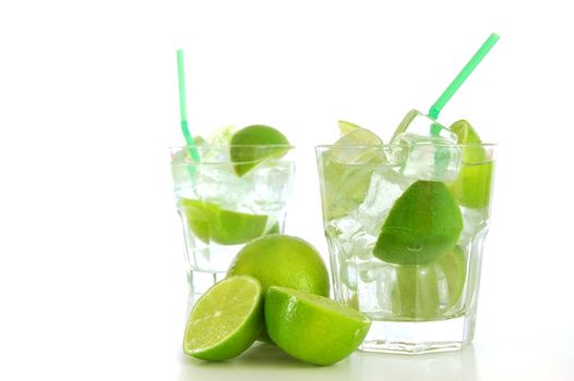cool green Caipirinha cocktail drink with lime