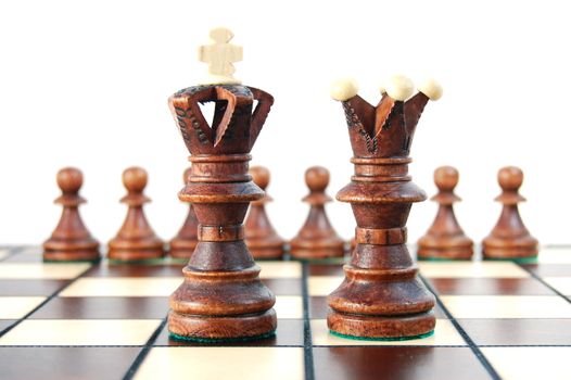 chess pieces on chess board showing concept for success and power