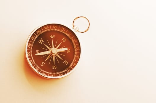 compass and white copyspace for text message