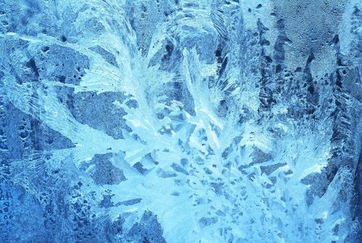 Blue frozen window pattern with nice abstract ice textured