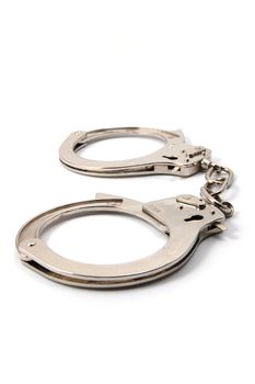 police handcuffs isolated on a white background