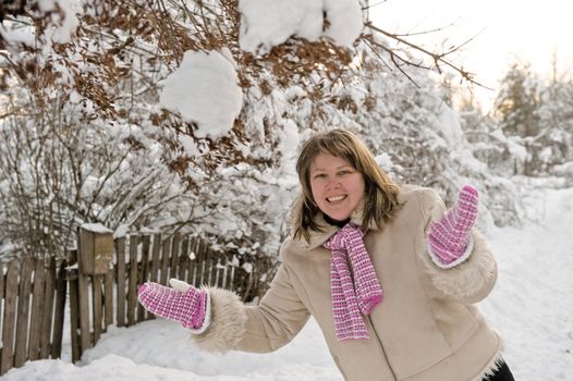 Happy middle-aged women having fun on winters day.