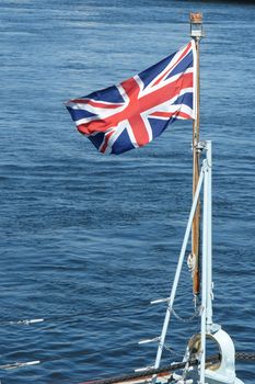 United Kingdom Flag Waving on water background                                