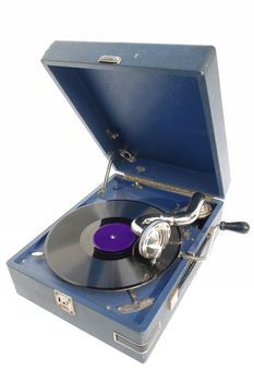  The device for playing phonograph records over white background.                            