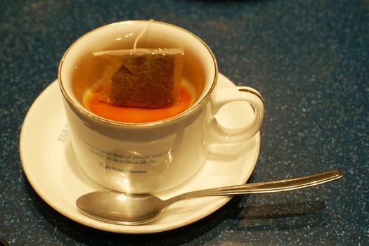 	Teacup on a blue background