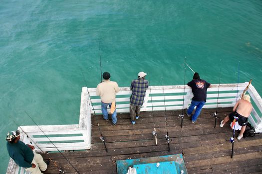 fishermen on pier