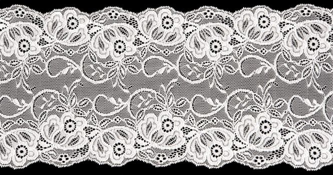 flowered  white lace on black background                               