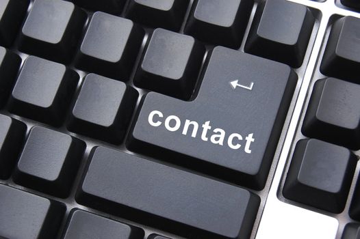 contact button on laptop showing computer support concept