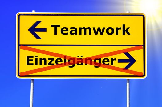 team or teamwork concept with a german sign