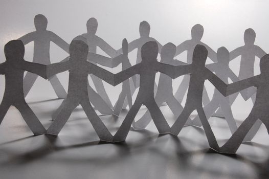 paper people doing teamwork in their business