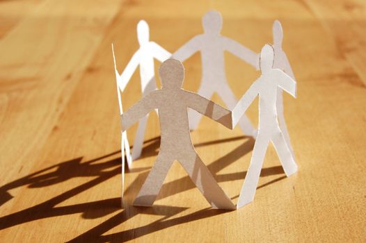 paper man showing concept for business teamwork and love