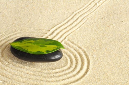 zen stone spa or wellness concept with sand