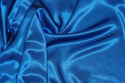 blue satin or silk background with textile texture