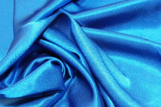 blue satin or silk background with textile texture