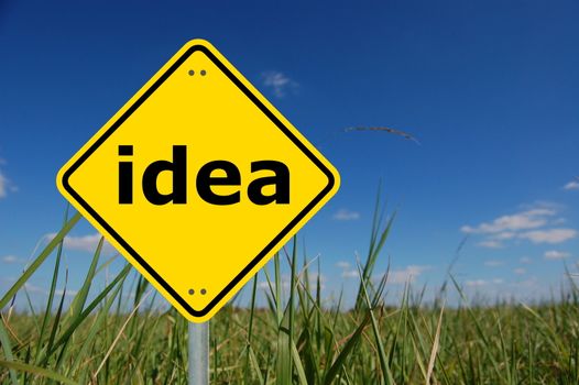 creativity and idea concept with yellow road sign