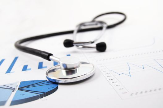 health and medical concept with stethoscope on diagram