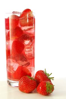 red strawberry cocktail drink in long glass