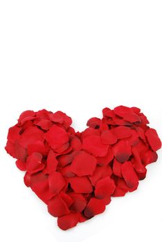 beaufiful red heart made of rose petals (isolated on white background)