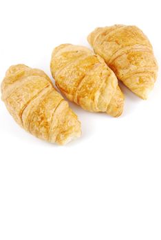 fresh croissants isolated on white background