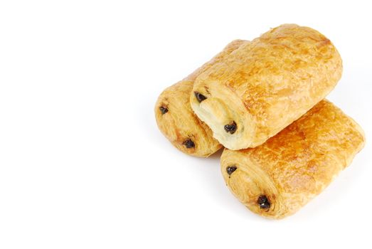 three fresh pain au chocolat isolated on white background