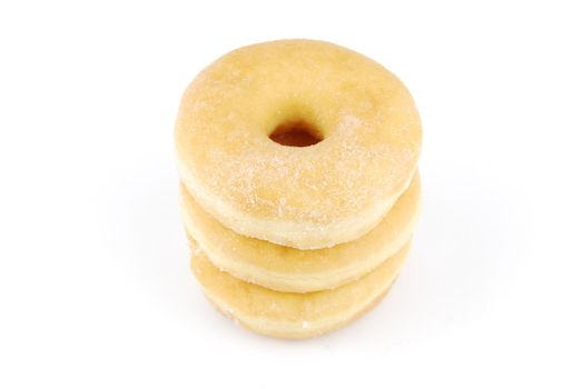 pile of delicious donuts isolated on white background (close up)
