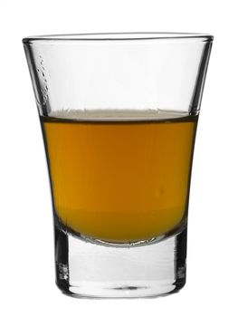 A shot of whisky on white background.