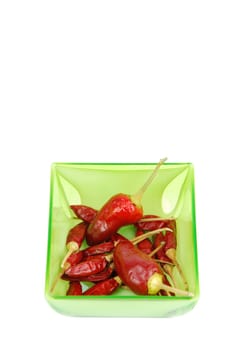 red chili peppers on a cup isolated on white background