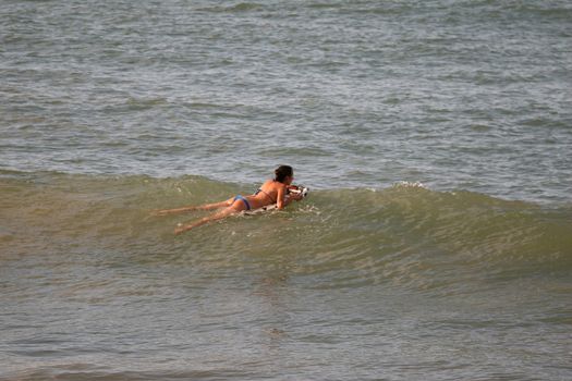 Bikini Girl swimmimg in the open water