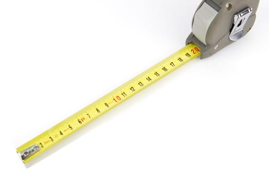 yellow retractable steel tape measure isolated on a white background
