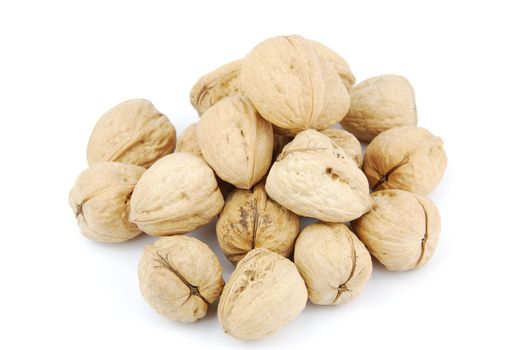 pile of walnuts isolated on white background
