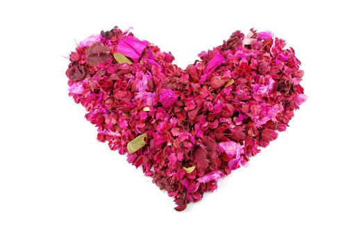 beaufiful pink heart made of dried petals, leaves, flowers (isolated on white background)