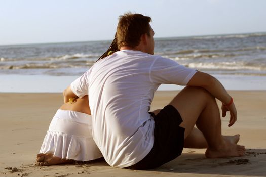 couple relaxing at the beach