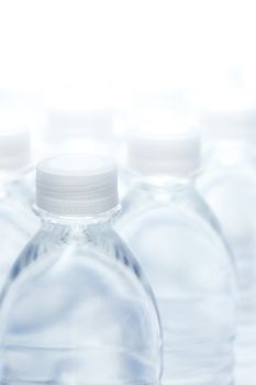 Water Bottles Abstract Image on a Gradated White Background.