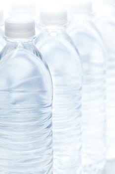 Water Bottles Abstract Image on a Gradated White Background.