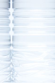 Water Bottles Abstract Image on a Gradated White Background.