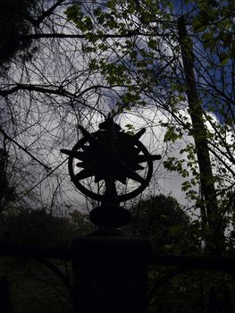 Gloomy decoration on a fence at Retiro Gardens in Madrid.