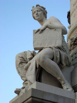 Statue near Prado Museum in Madrid.
