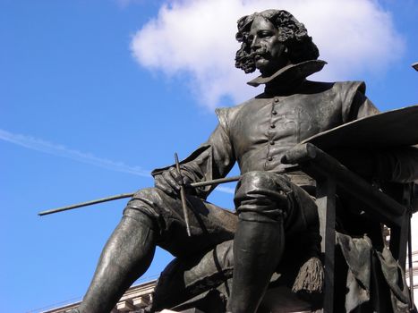 Statue of the famous painter Velazquez situated in front of the entrance of the Prado Museum in Madrid, Spain.