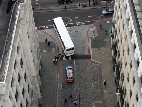 Top view from The Monument of a coloured taxi in London.