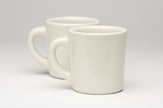 Blank Coffee Cups on a gradating background.