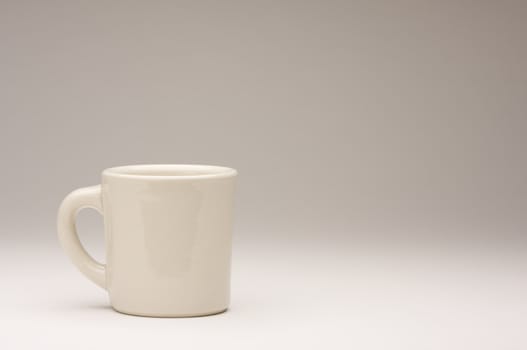 Blank Coffee Cup on a gradating background.