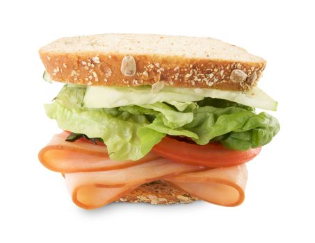 Hearty Sandwich Filled with Vegetables and Sliced Meat Isolated on White.