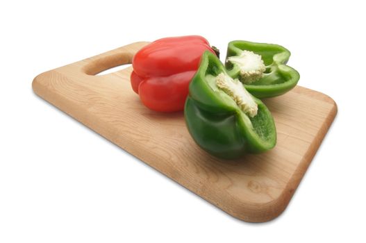 Green and Red Bell Peppers and Knife on a Wood Cutting Board