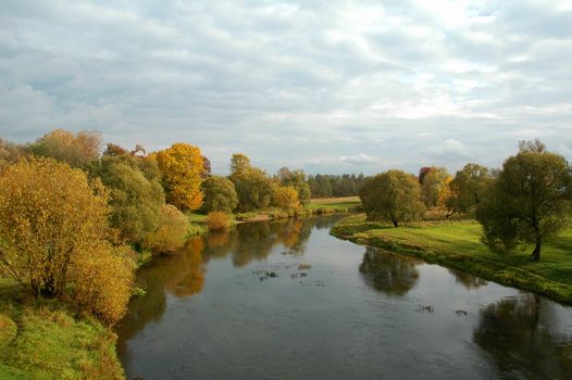 Gold autumn at the river Dubna (Russia)