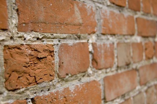 An old weathered brick wall background