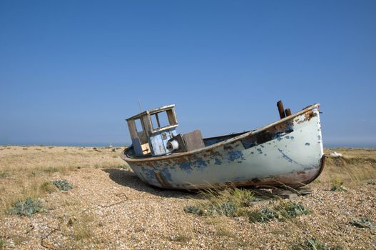 An old fishing boat on the beach at Dungeness