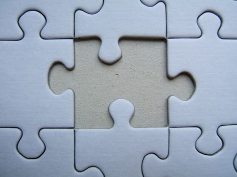 Blue jigsaw frame with empty copy space in the middle