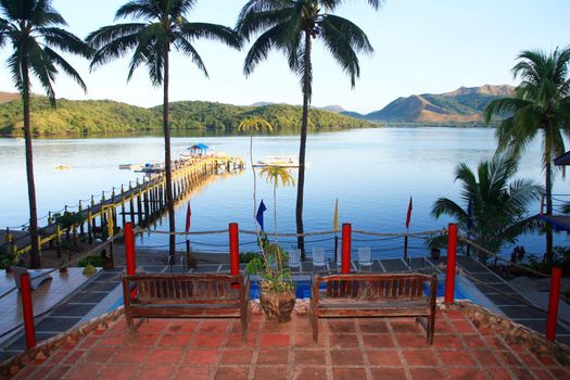 scenic view  of the horizon from an island resort 
