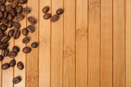 Grains of coffee on a wooden carpet 8