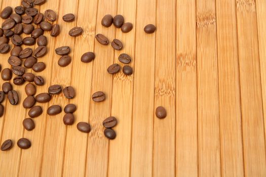 Grains of coffee on a carpet made of a tree 5